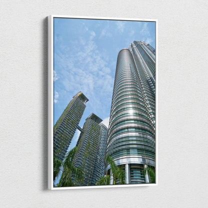 Urban architecture canvas wall art featuring modern skyscrapers against a blue sky.