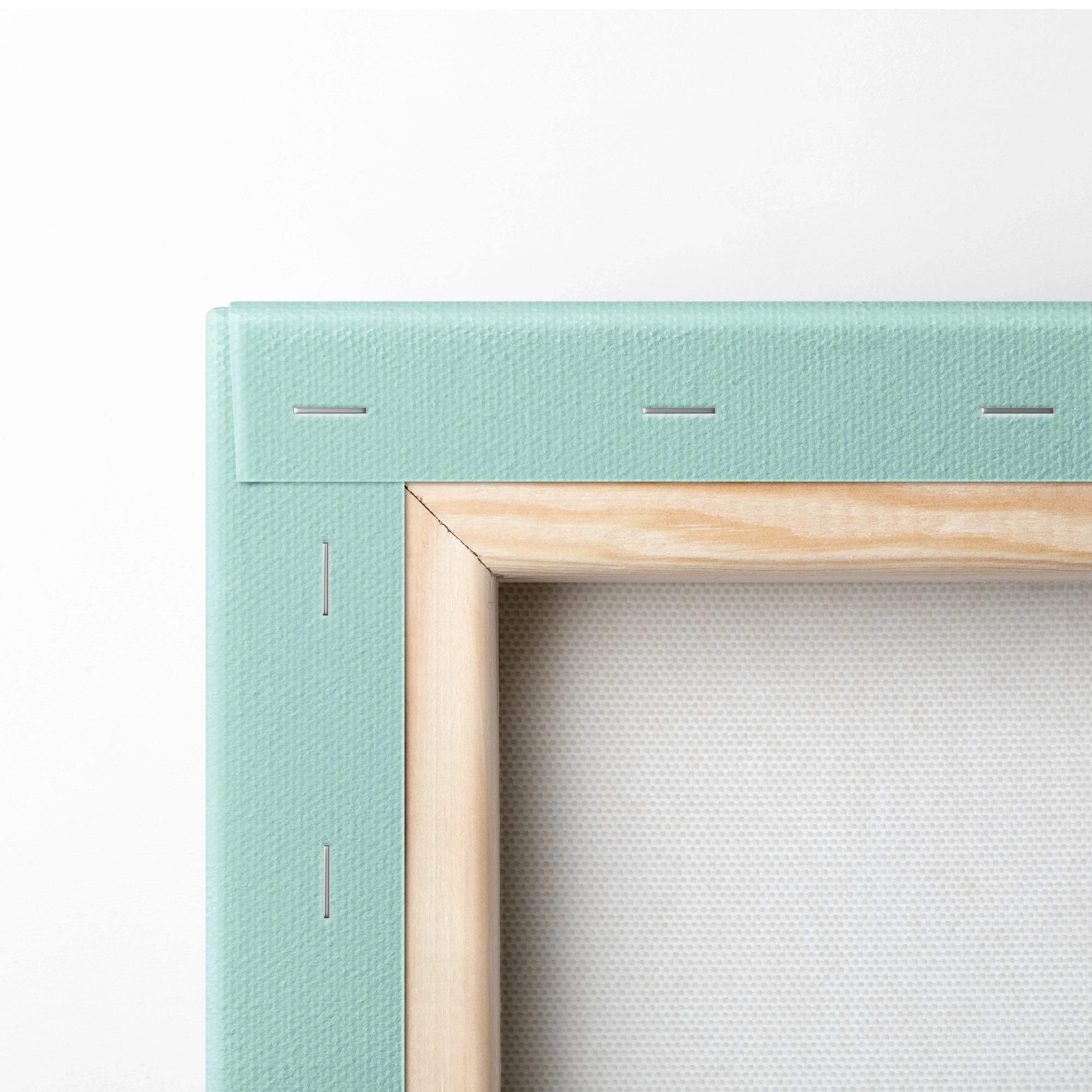 Mint green canvas frame with light wood border and teal navy orange geometric art