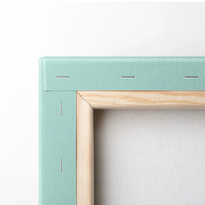 Mint green canvas frame with light wood border and teal navy orange geometric art