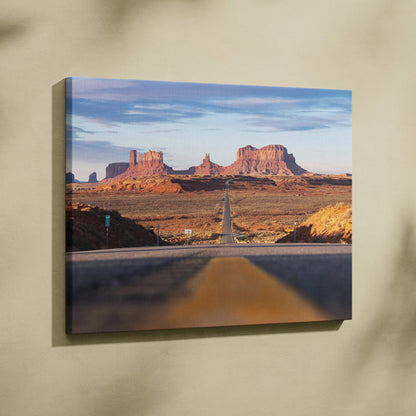 Majestic desert landscape canvas wall art with open road and rock formations under blue sky.