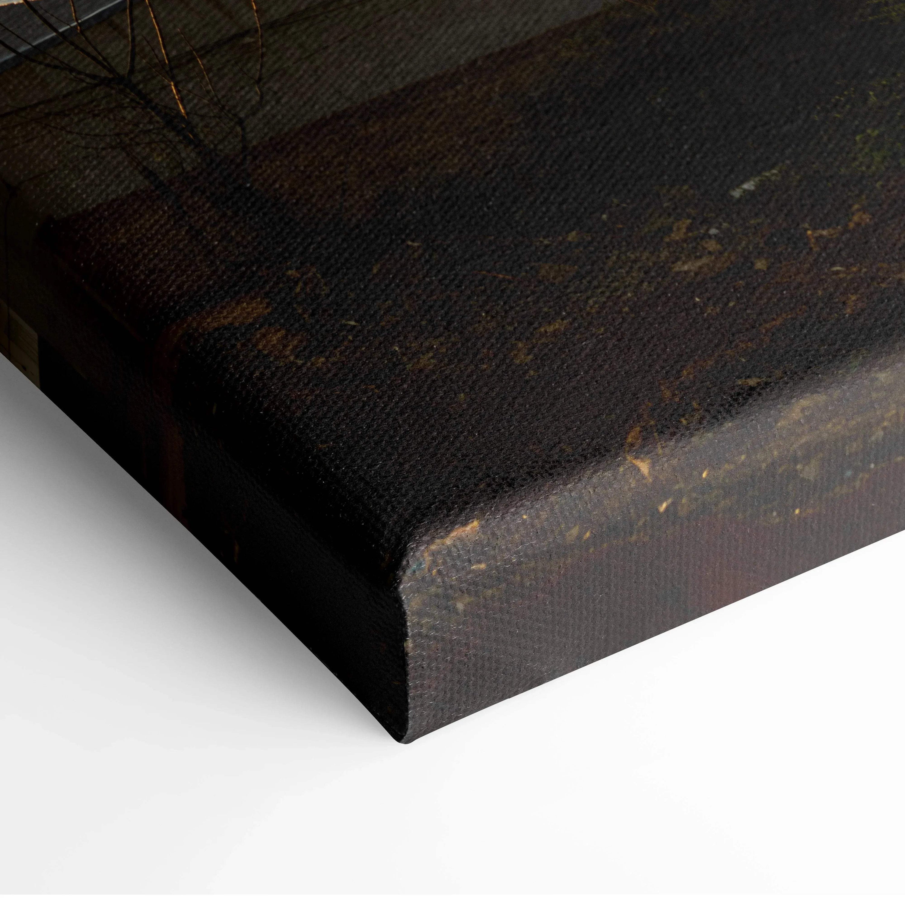 Close-up of dark mountain landscape canvas wall art corner with textured edges.
