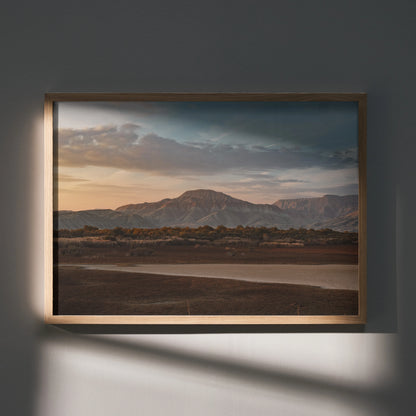 Majestic mountain landscape poster with warm sunset tones in wooden frame wall art.
