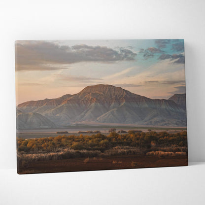 Canvas wall art featuring majestic mountain desert landscape with soft sunset lighting.