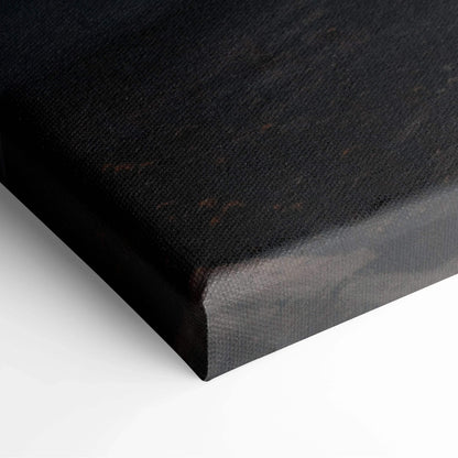 Close-up of black textured canvas corner with subtle brown and gray tones in wall art.