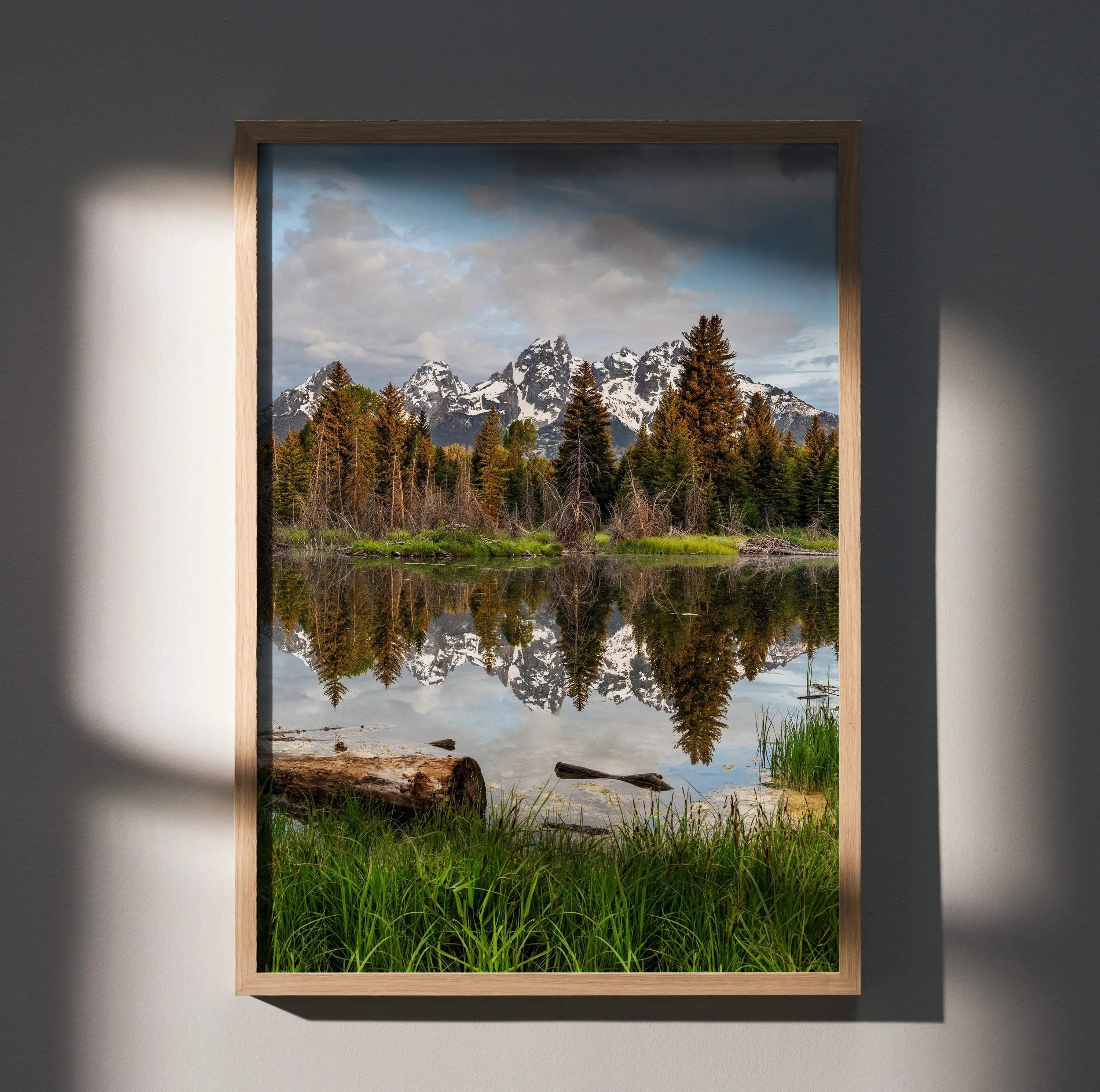 Vertical mountain landscape poster wall art with snow-capped peaks reflected in calm water.