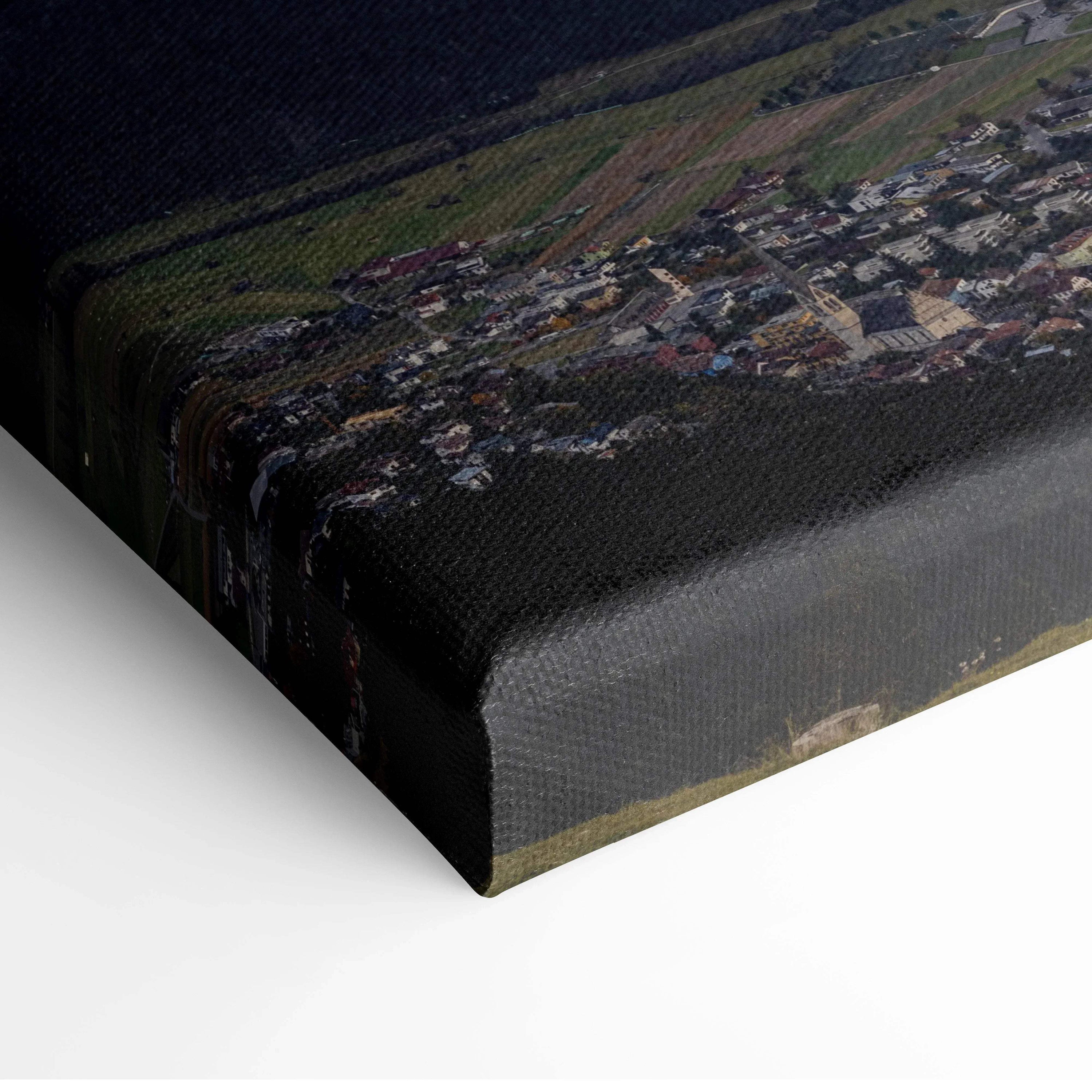 Majestic mountain landscape printed on textured canvas wall art with rich colors and detailed scenery.