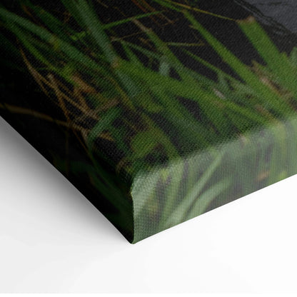 Close-up of stretched canvas corner featuring green and brown tones in stunning windmill sunset landscape wall art.