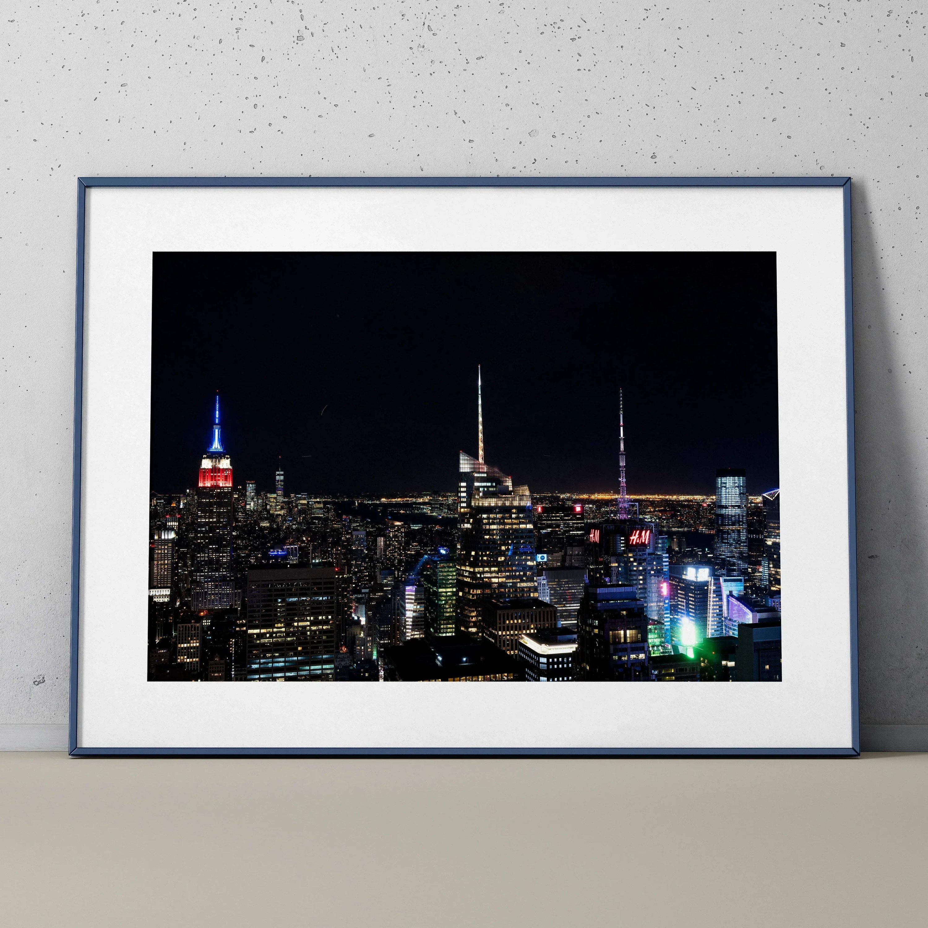 City night skyline wall art poster with illuminated skyscrapers and dark sky.