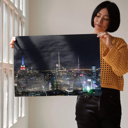 City night skyline art print poster with illuminated buildings and dark sky, perfect wall art decor.