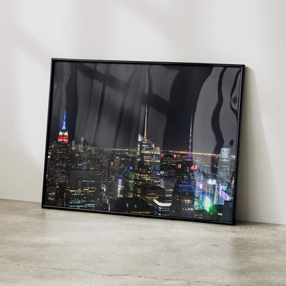 Captivating city night skyline poster with illuminated skyscrapers in sleek black frame wall art.