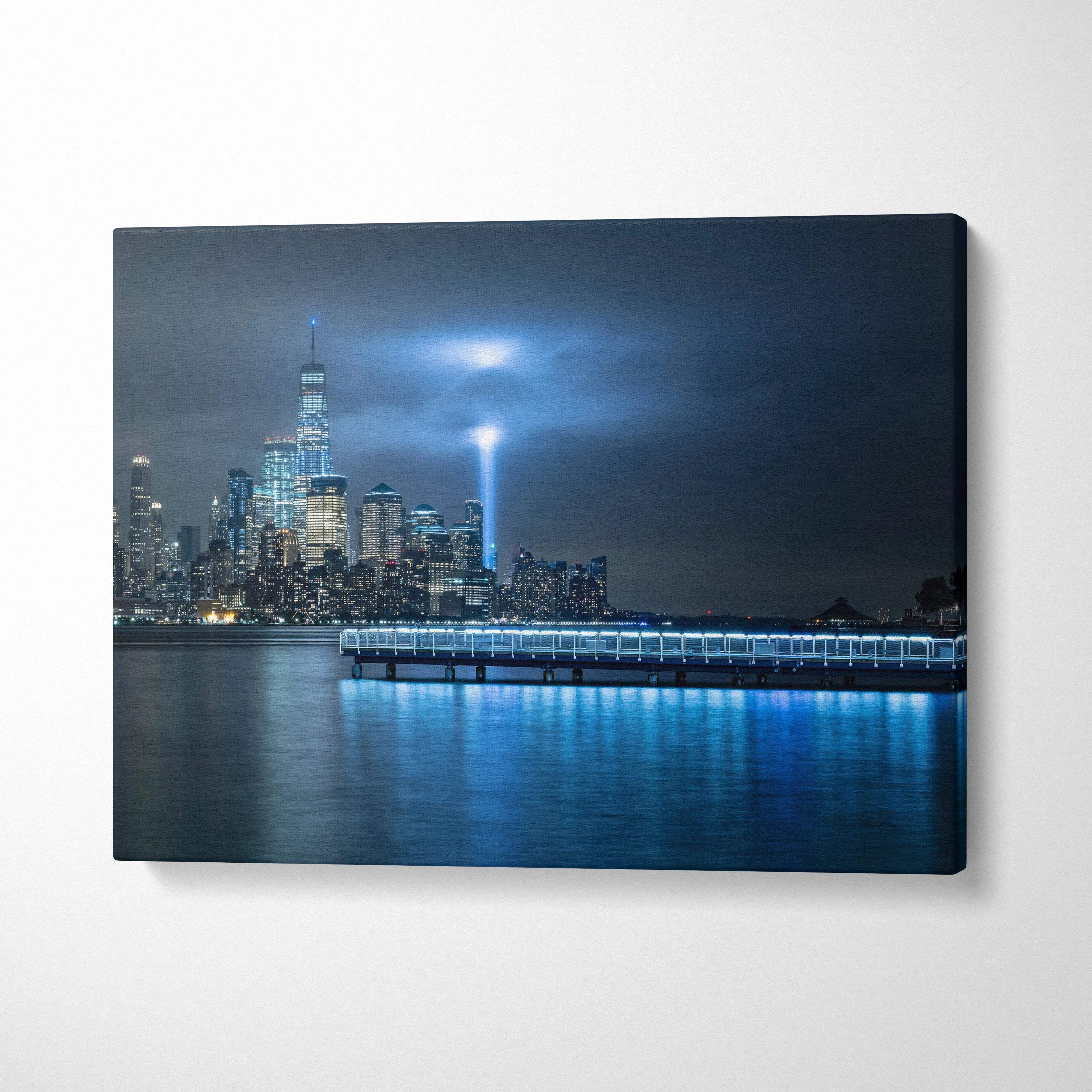 Blue-lit NYC skyline canvas with One World Trade Center and memorial beam