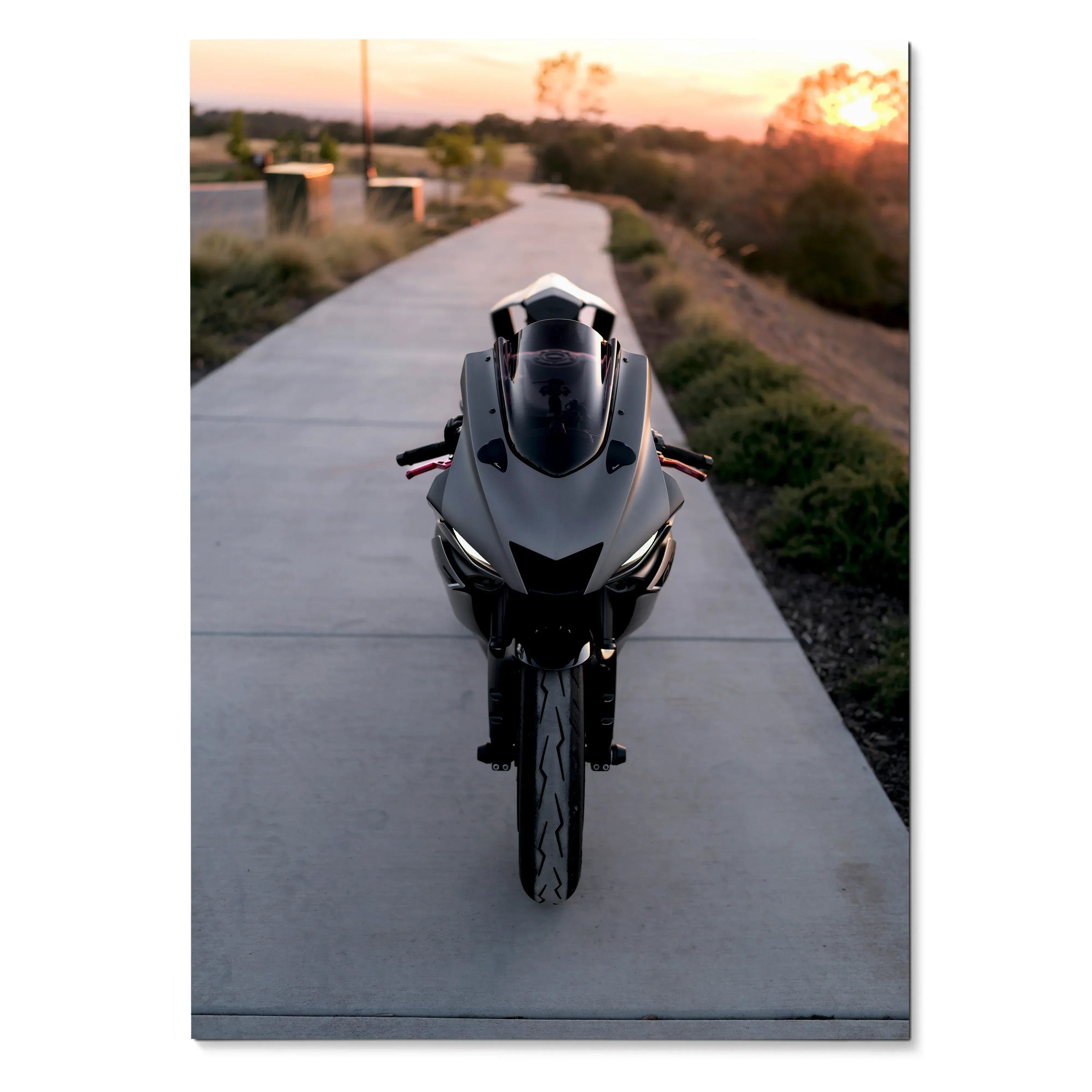 Yamaha R6 motorcycle front view on sunset road poster wall art with sleek black bike.
