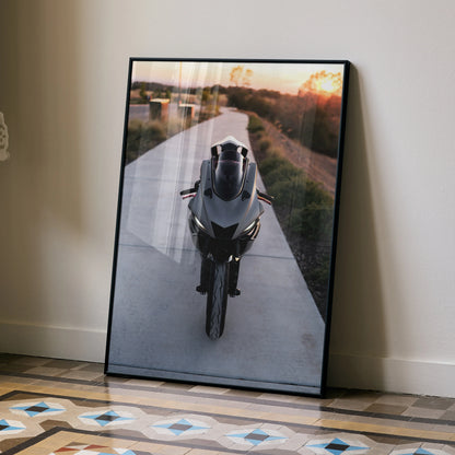 Yamaha R6 motorcycle poster with dramatic sunset background leaning on wall, sleek sportbike wall art.