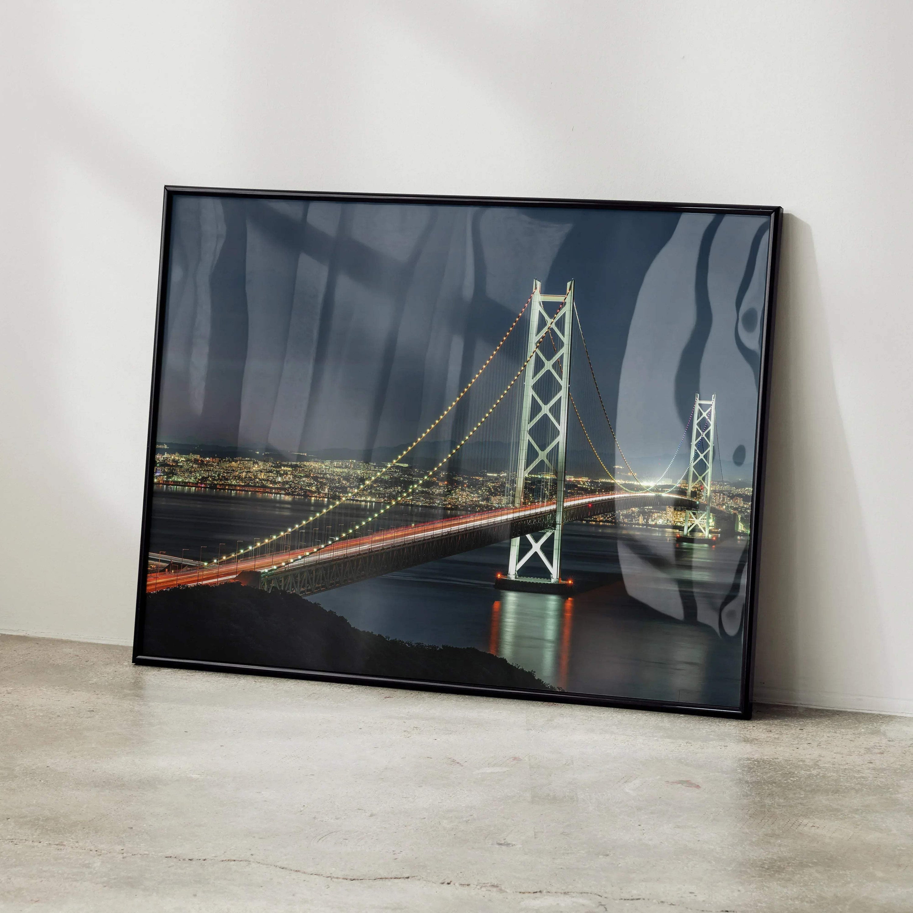 City night skyline wall art featuring illuminated suspension bridge with glowing cables on black background.