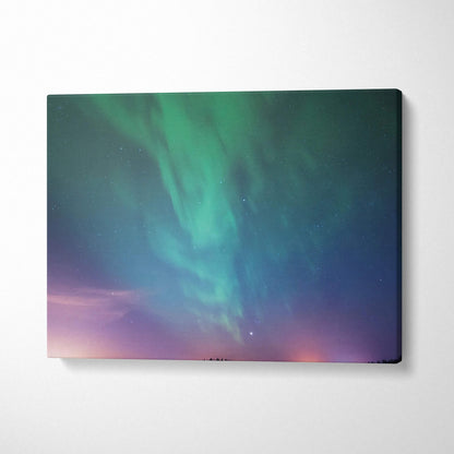 Northern lights over calm lake and forest silhouette canvas wall art
