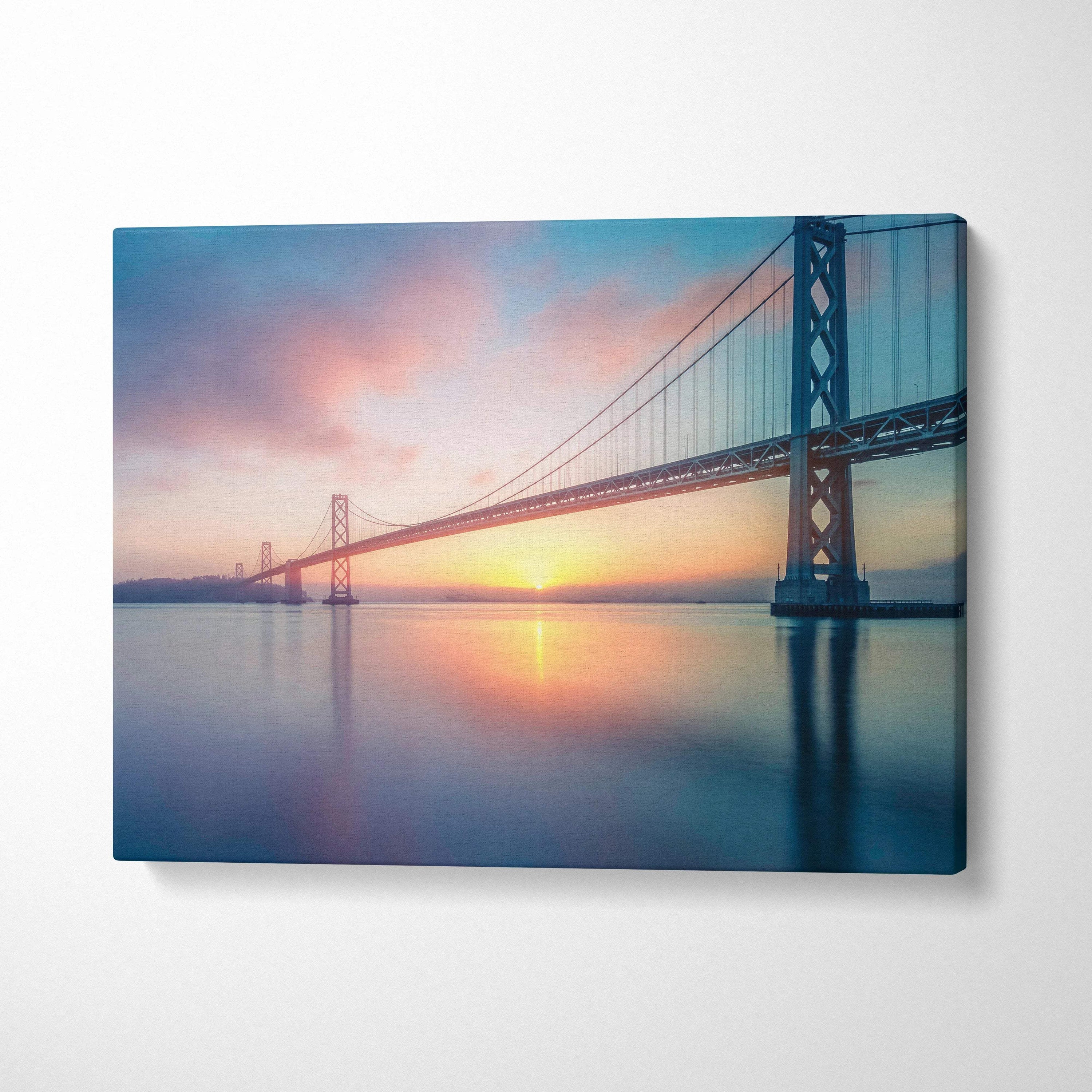 Cinematic Bay Area bridge at sunrise canvas wall art in soft blues golds pinks