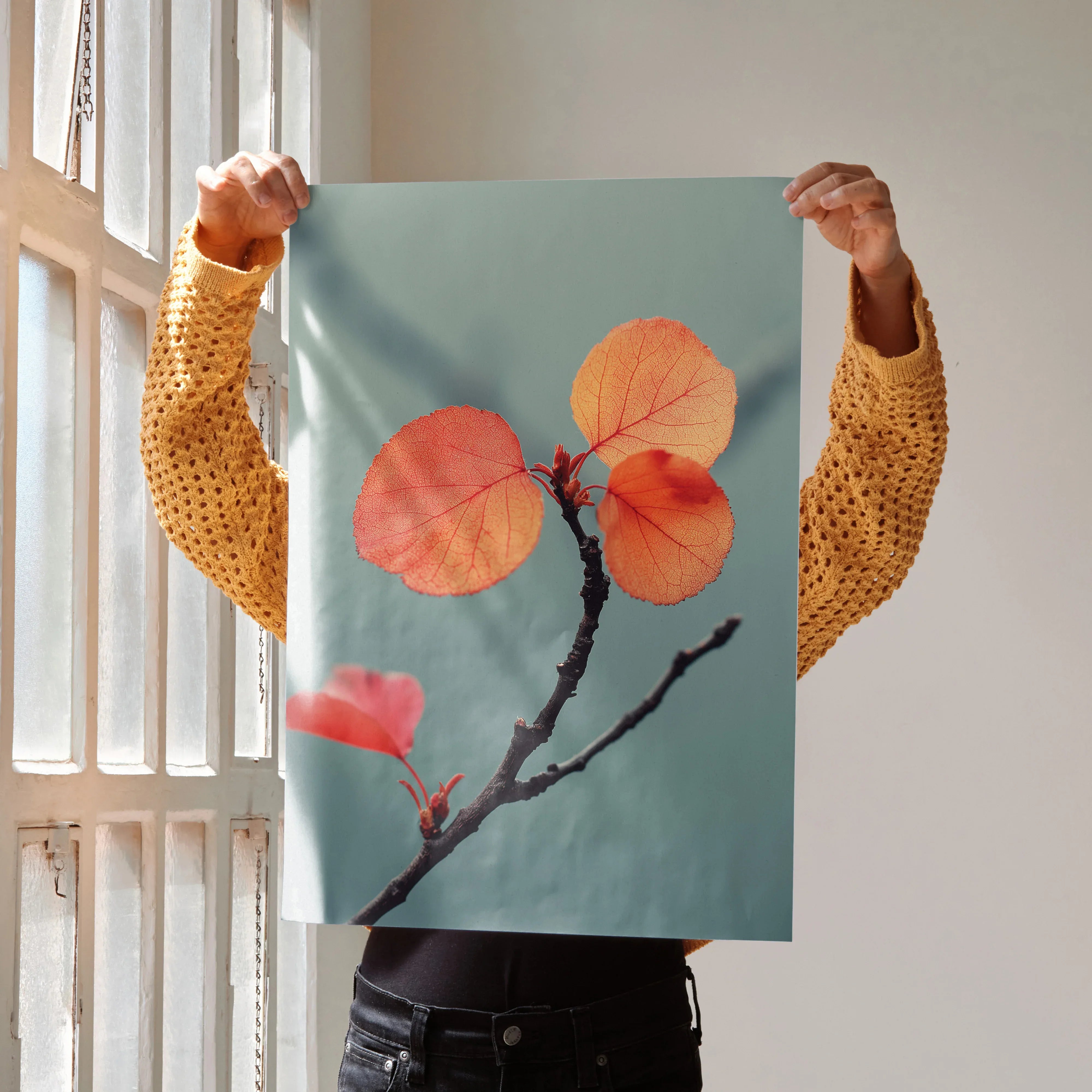 Vibrant autumn leaves on a branch against a muted blue background poster wall art.