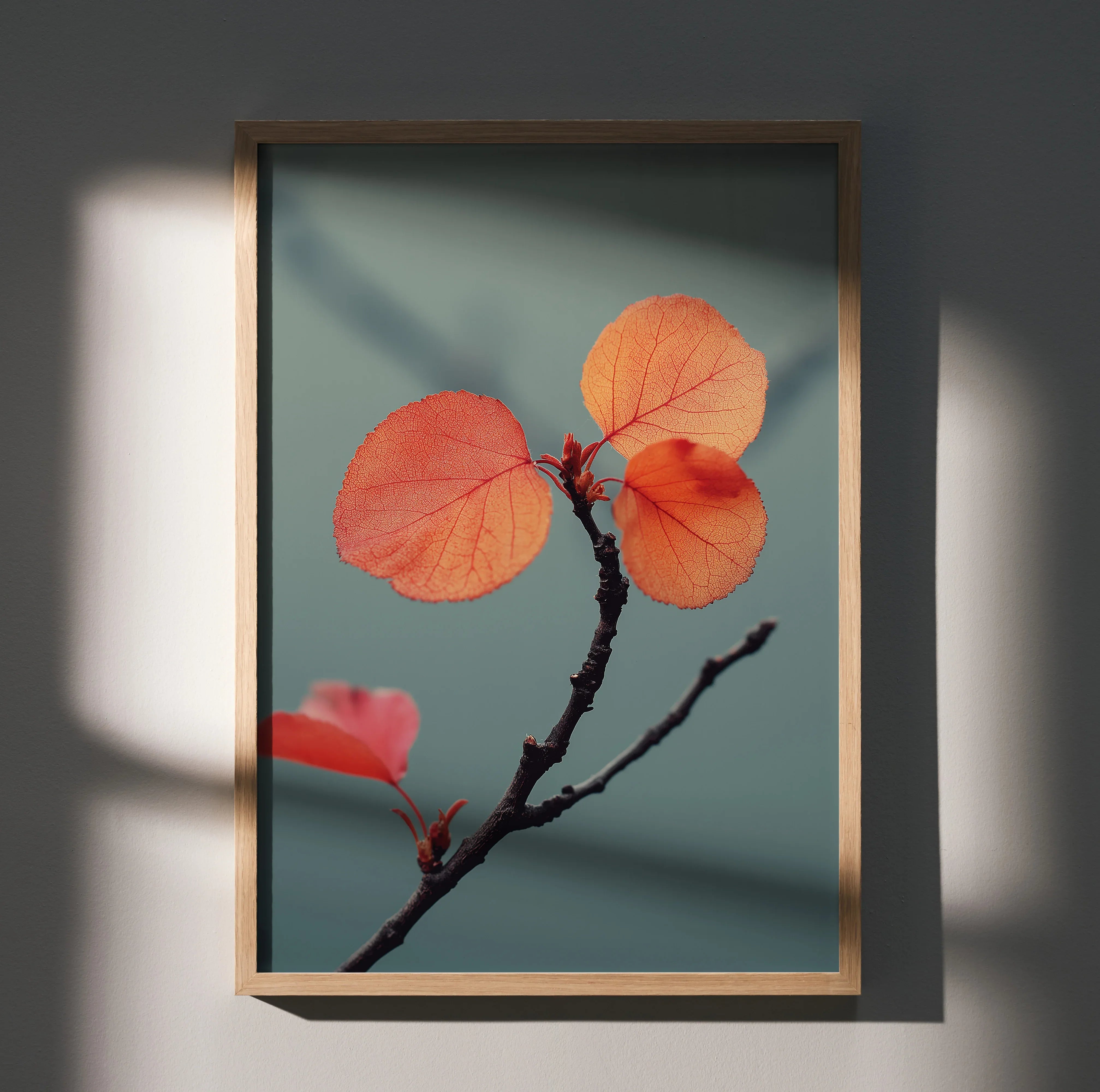 Vibrant autumn leaves on branch with teal background framed poster wall art.