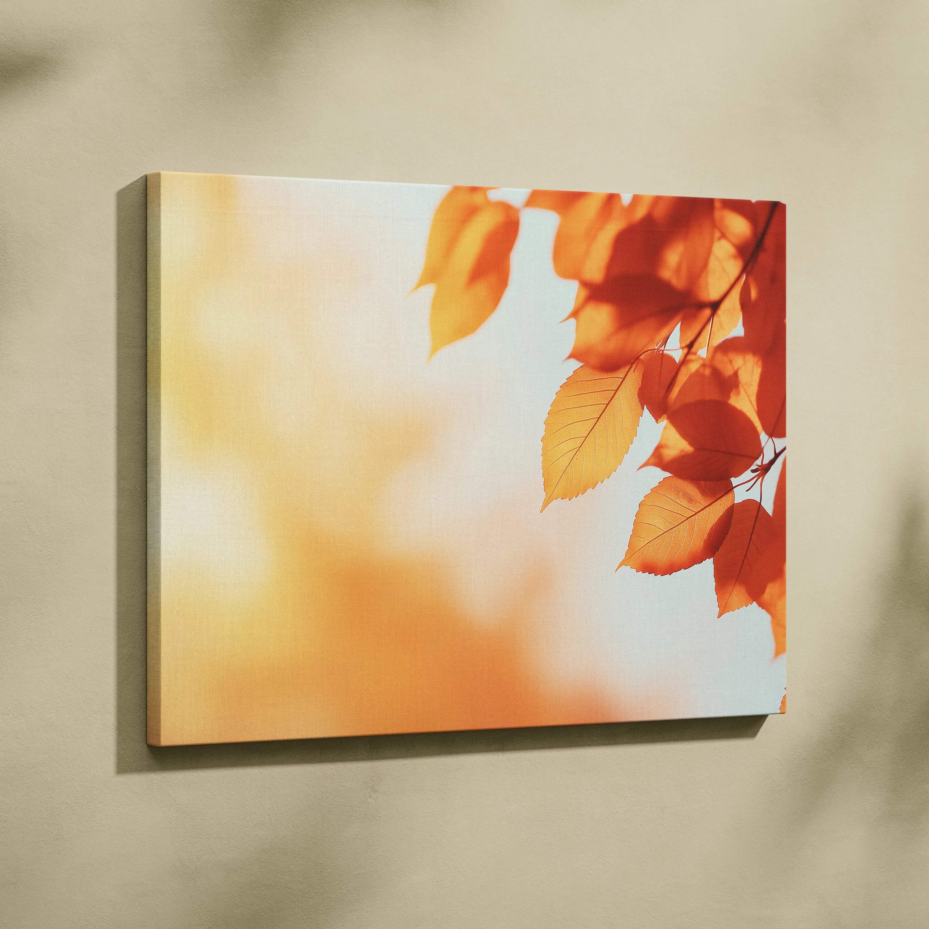 Canvas wall art featuring vibrant orange autumn leaves against a soft, blurred background.