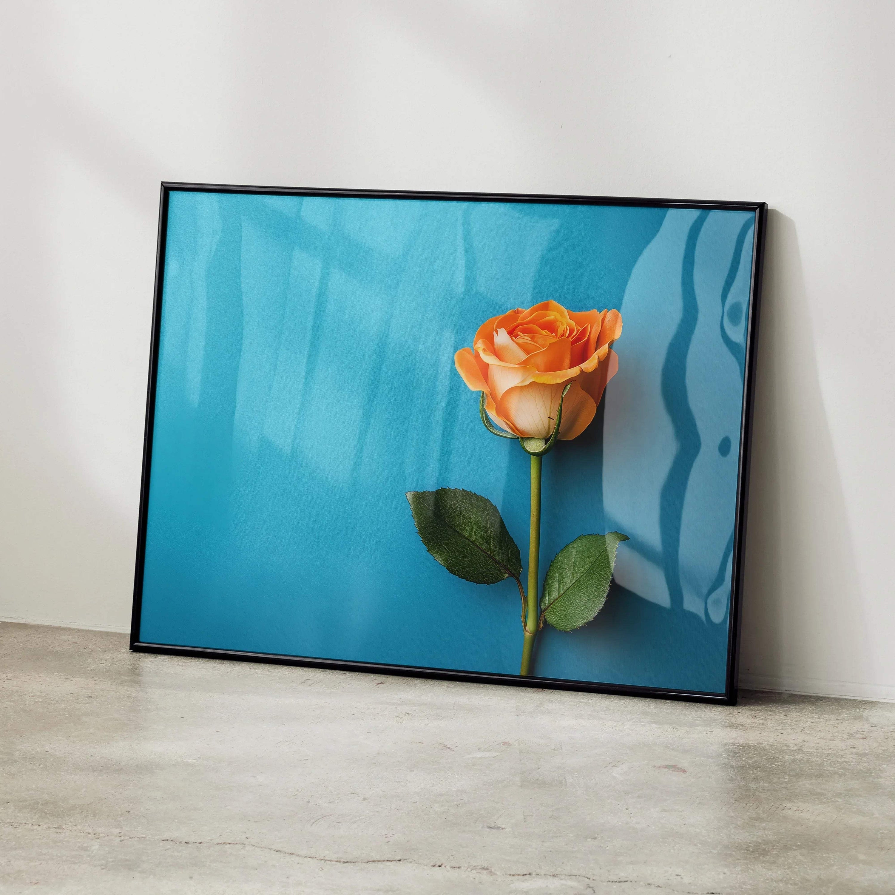 Vibrant orange rose floral art poster with green leaves on bright blue background wall art.