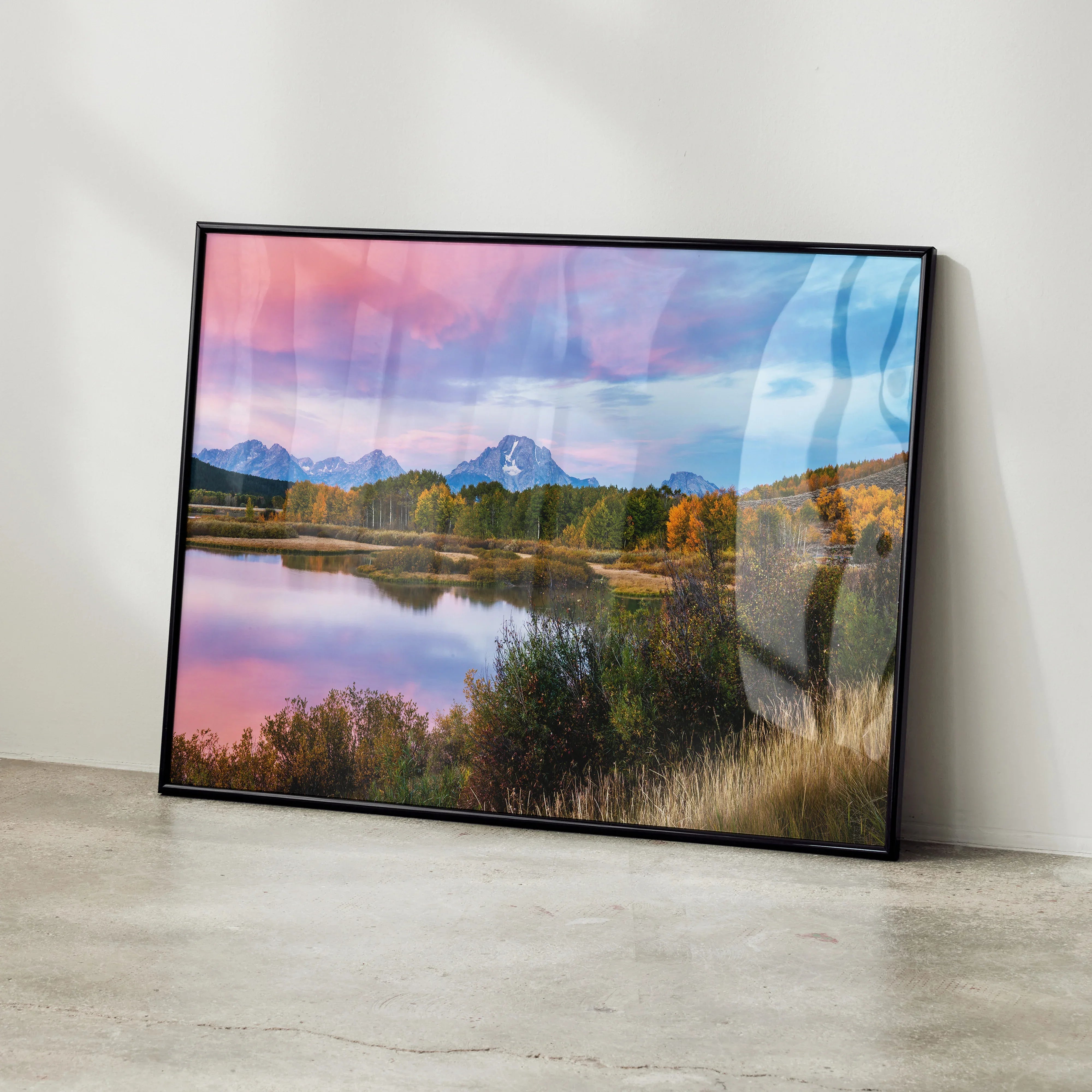 Mountain sunset poster wall art with vibrant pink and blue sky reflecting on calm lake.