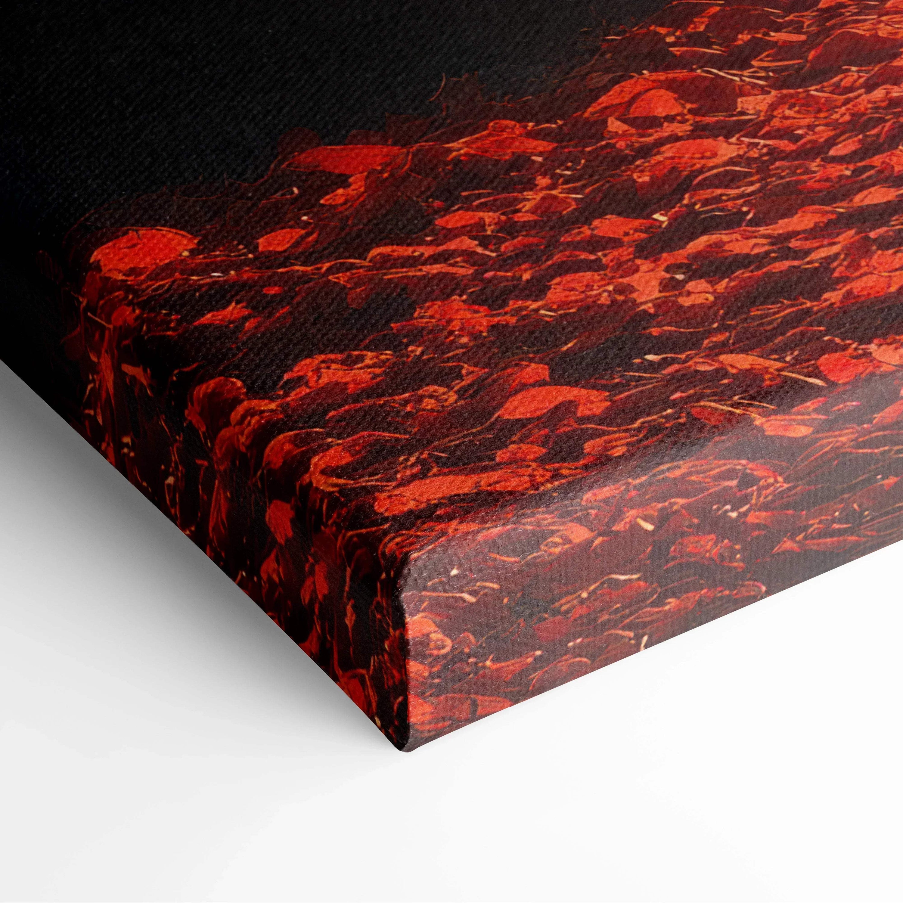 Close-up of vibrant red and orange autumn leaves on textured canvas wall art edge.
