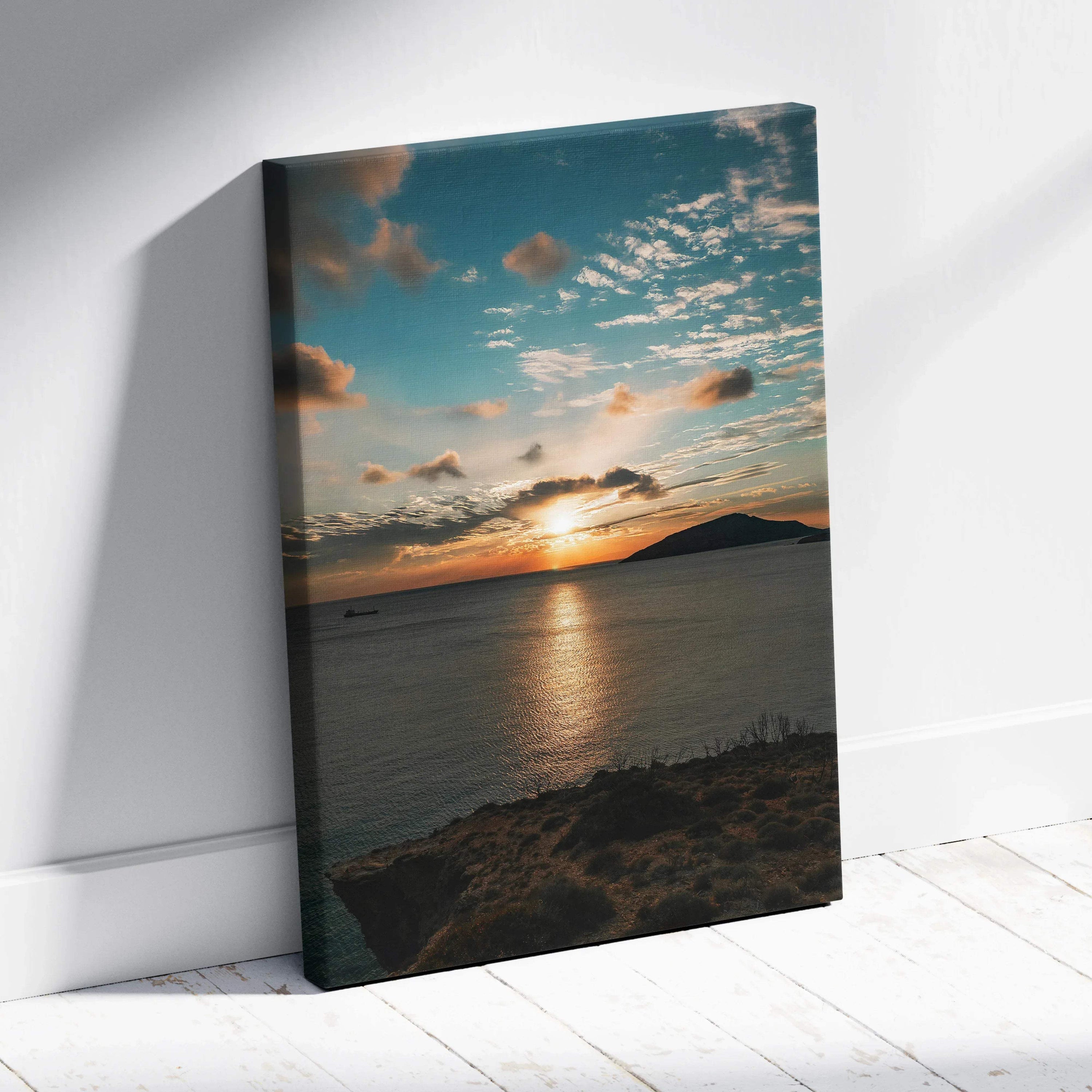 Canvas wall art featuring a vibrant ocean sunset with dramatic clouds and silhouetted hillside.