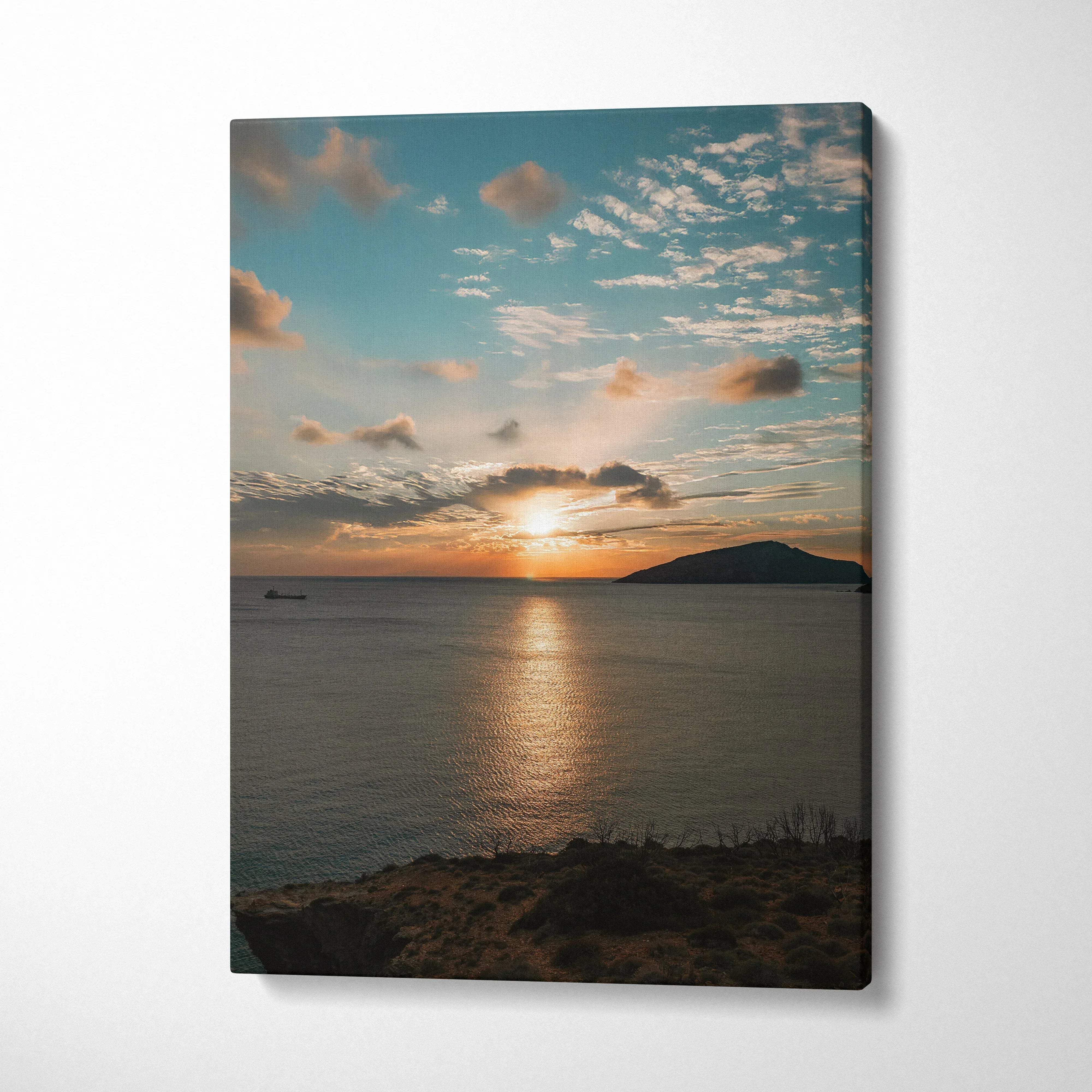 Ocean sunset canvas wall art with vibrant orange and blue sky reflecting on calm water.