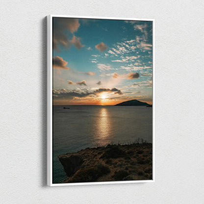 Vertical canvas wall art featuring a vibrant ocean sunset with dramatic clouds over calm waters.