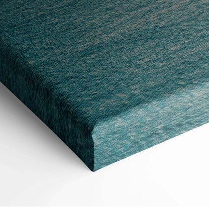 Tranquil ocean sunset canvas wall art with textured teal and blue hues.