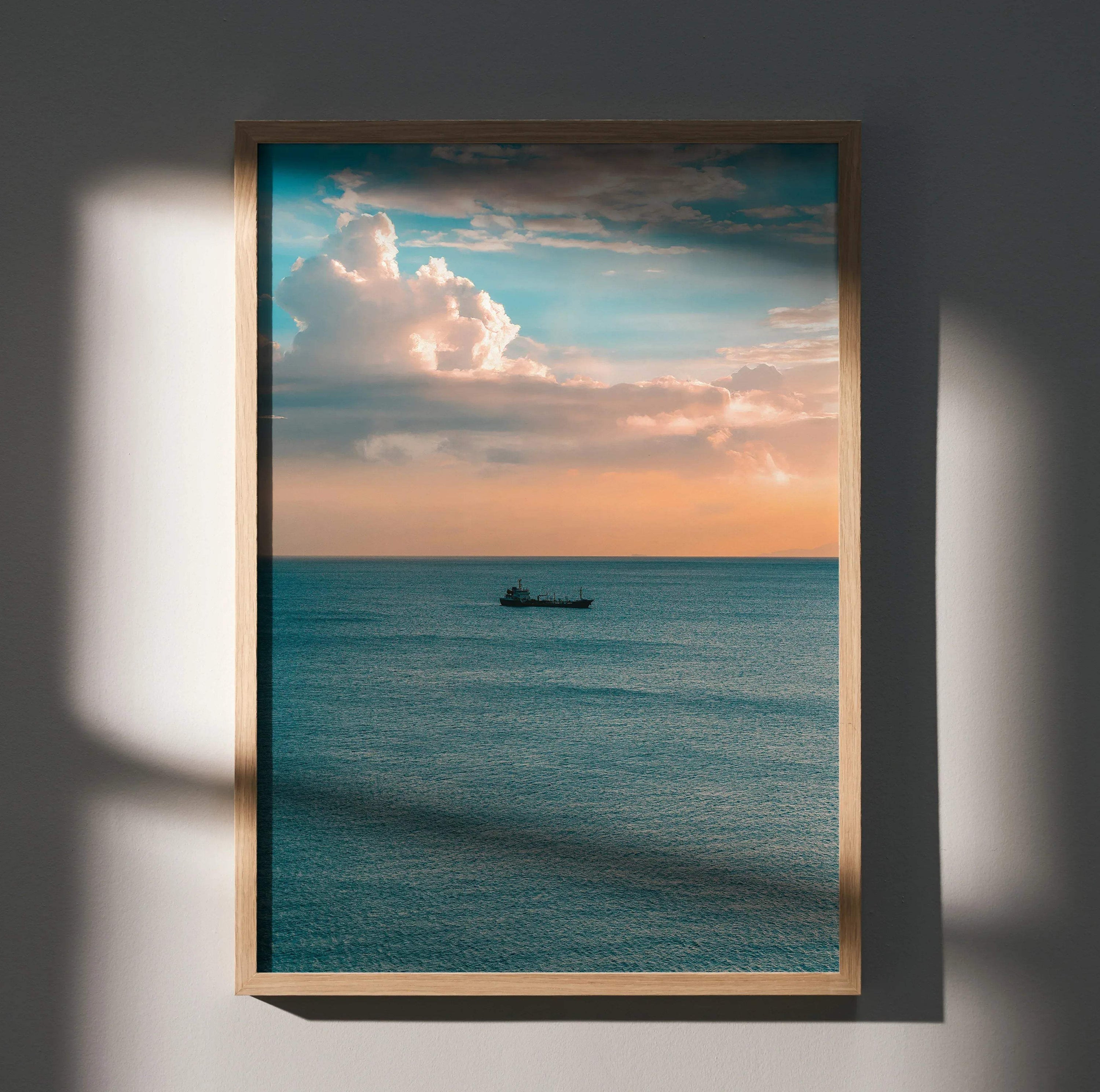 Vertical ocean sunset poster with vibrant sky and calm water framed as wall art.