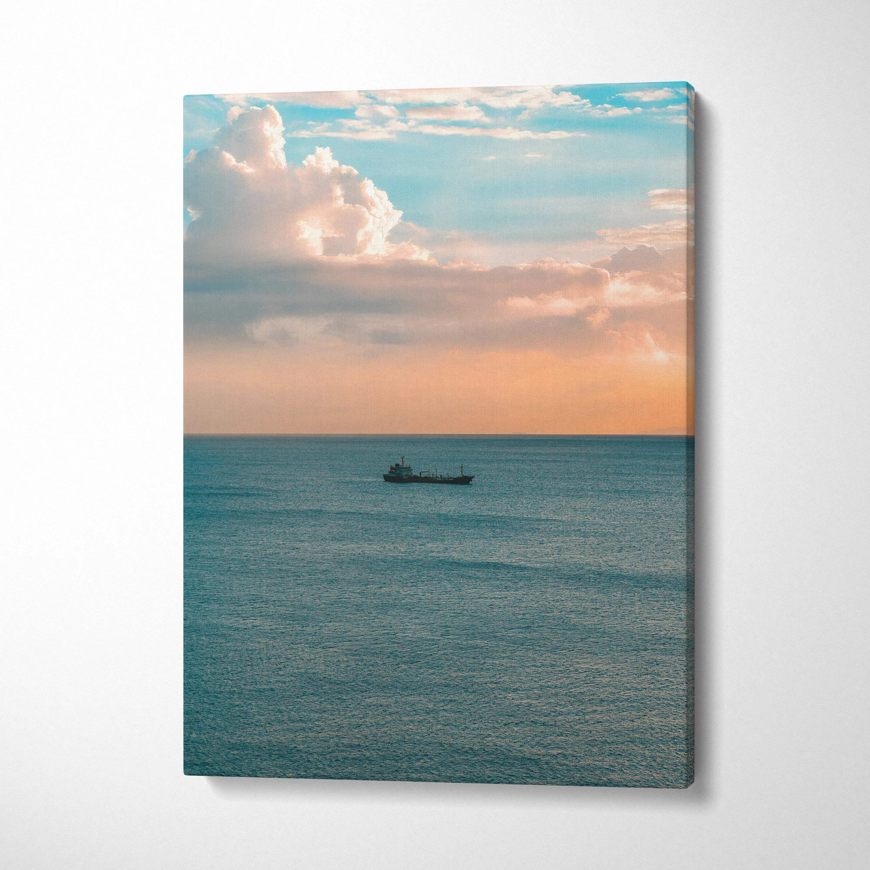 Vertical canvas wall art of calm ocean at sunset with soft clouds and warm colors.