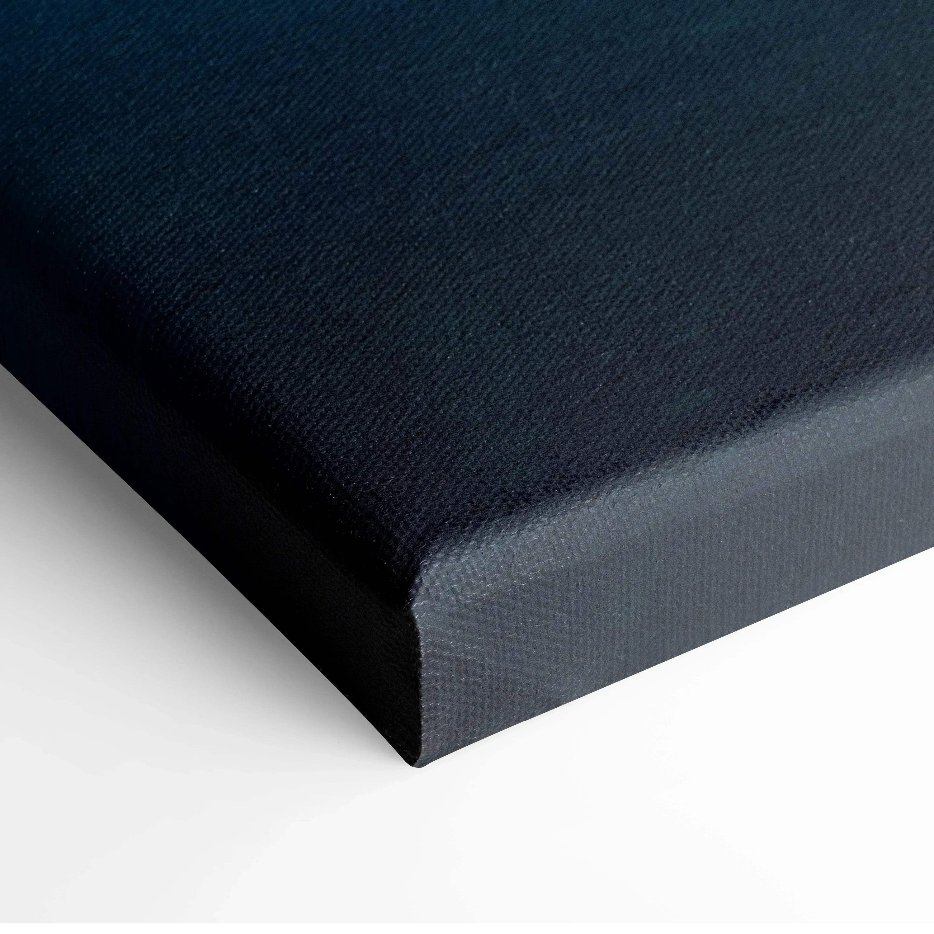 Dark blue wrapped canvas wall art corner showing textured material and neat edges.