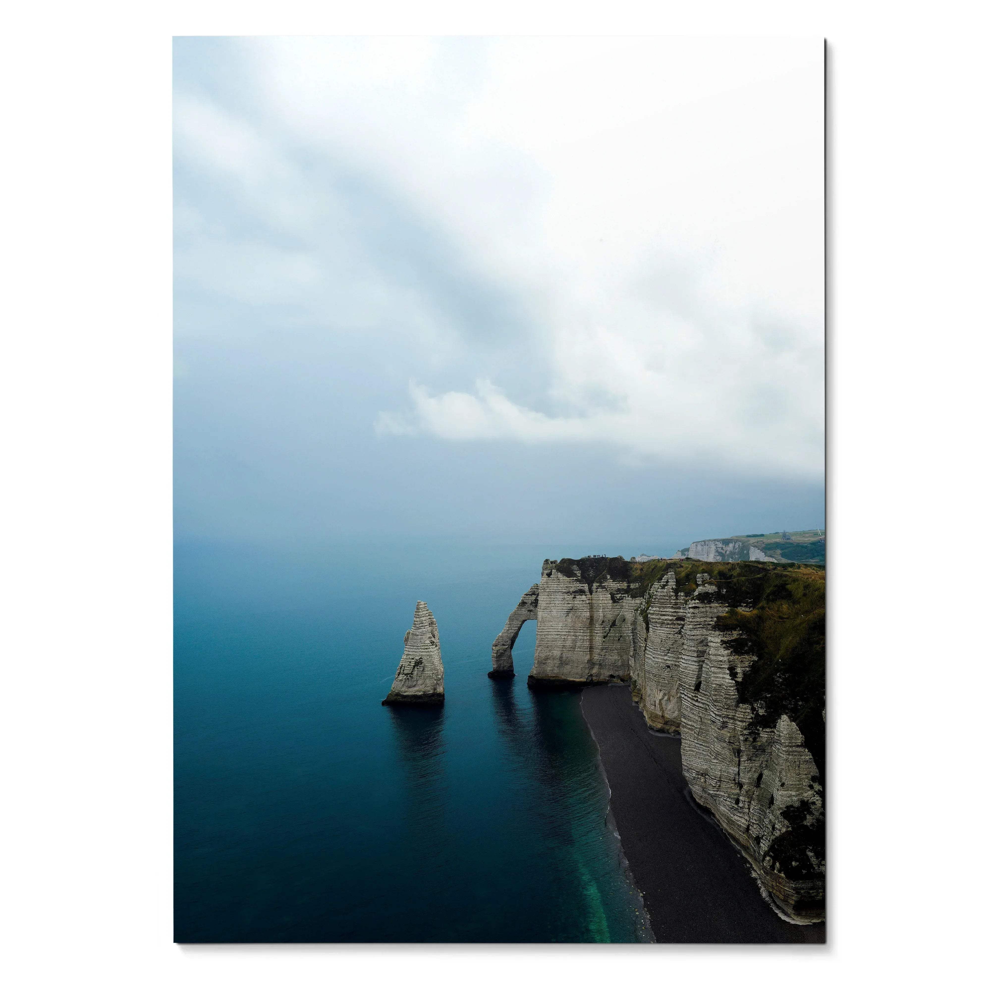 Ocean cliff and rock formation over deep blue water nature wall art poster in vertical format.