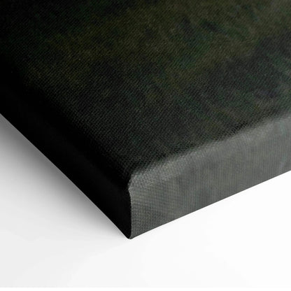 Corner close-up of black canvas wall art with textured fabric and wrapped edges.