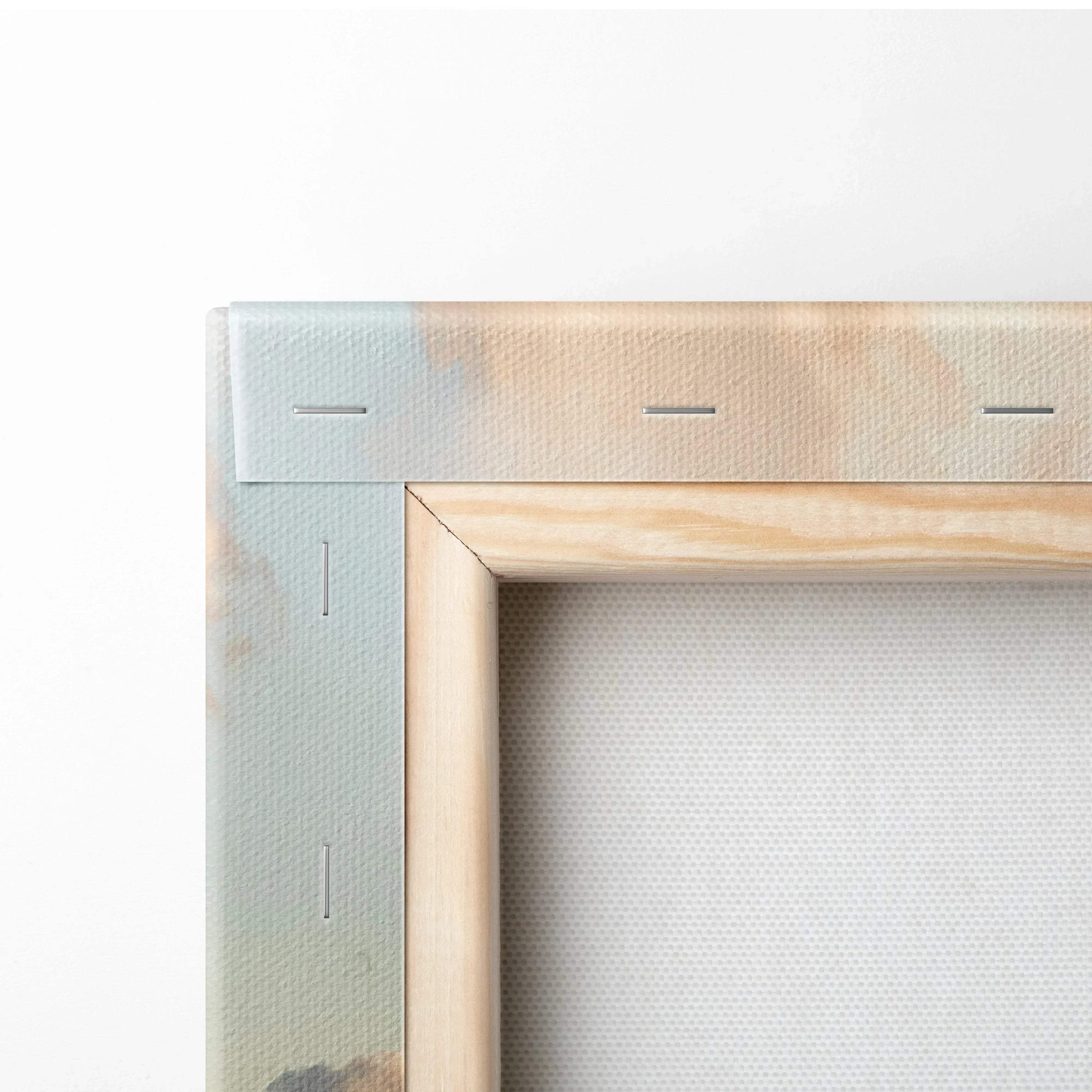Close-up of wooden frame corner and stretched canvas back of canvas wall art print.