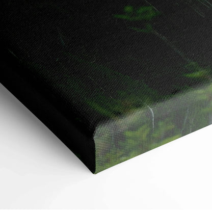 Close-up of green and black abstract canvas wall art corner with textured fabric surface.