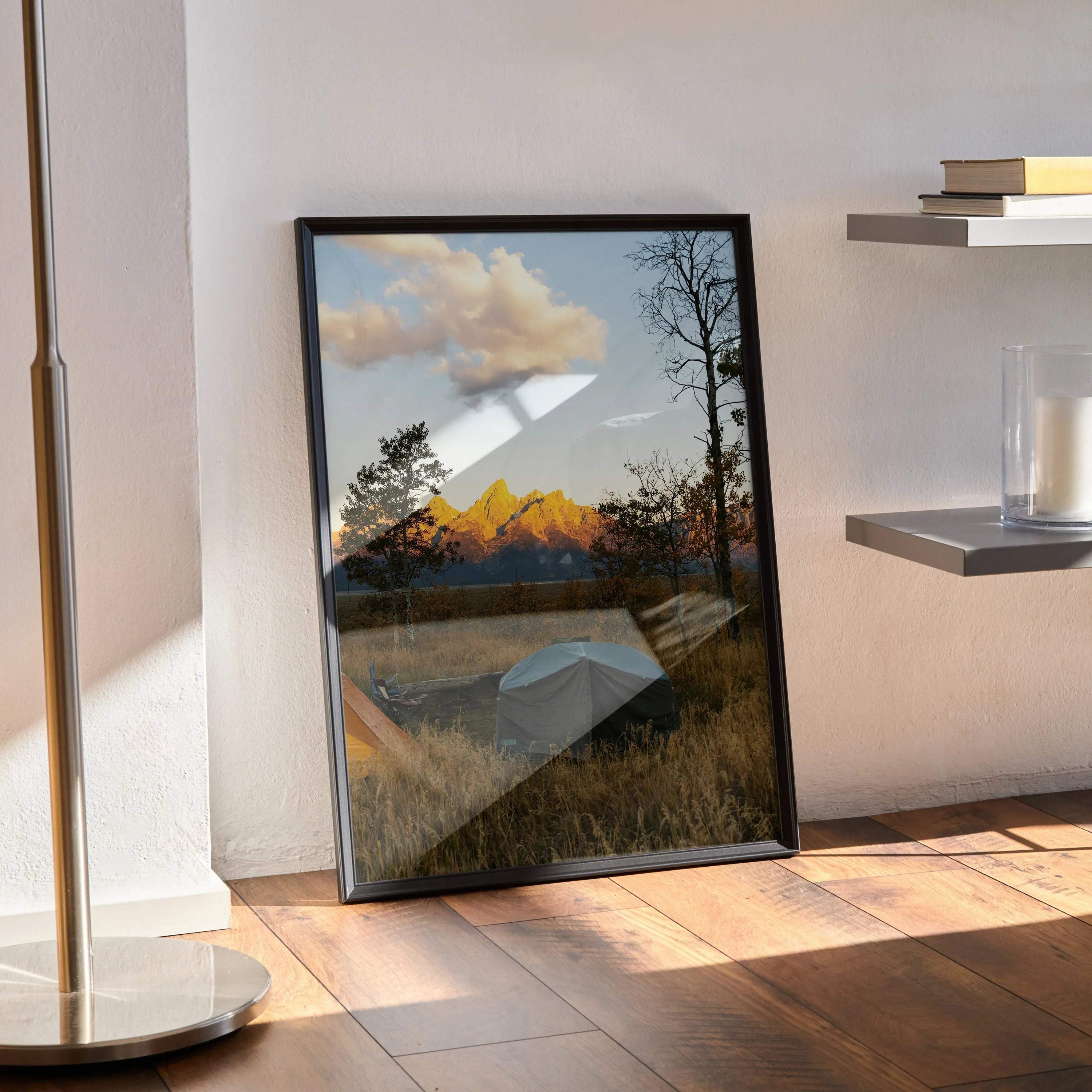 Vertical wall art poster featuring majestic mountain peaks at sunset with golden light and silhouetted trees.