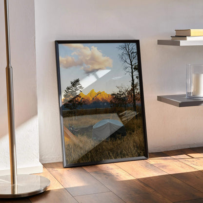 Vertical wall art poster featuring majestic mountain peaks at sunset with golden light and silhouetted trees.