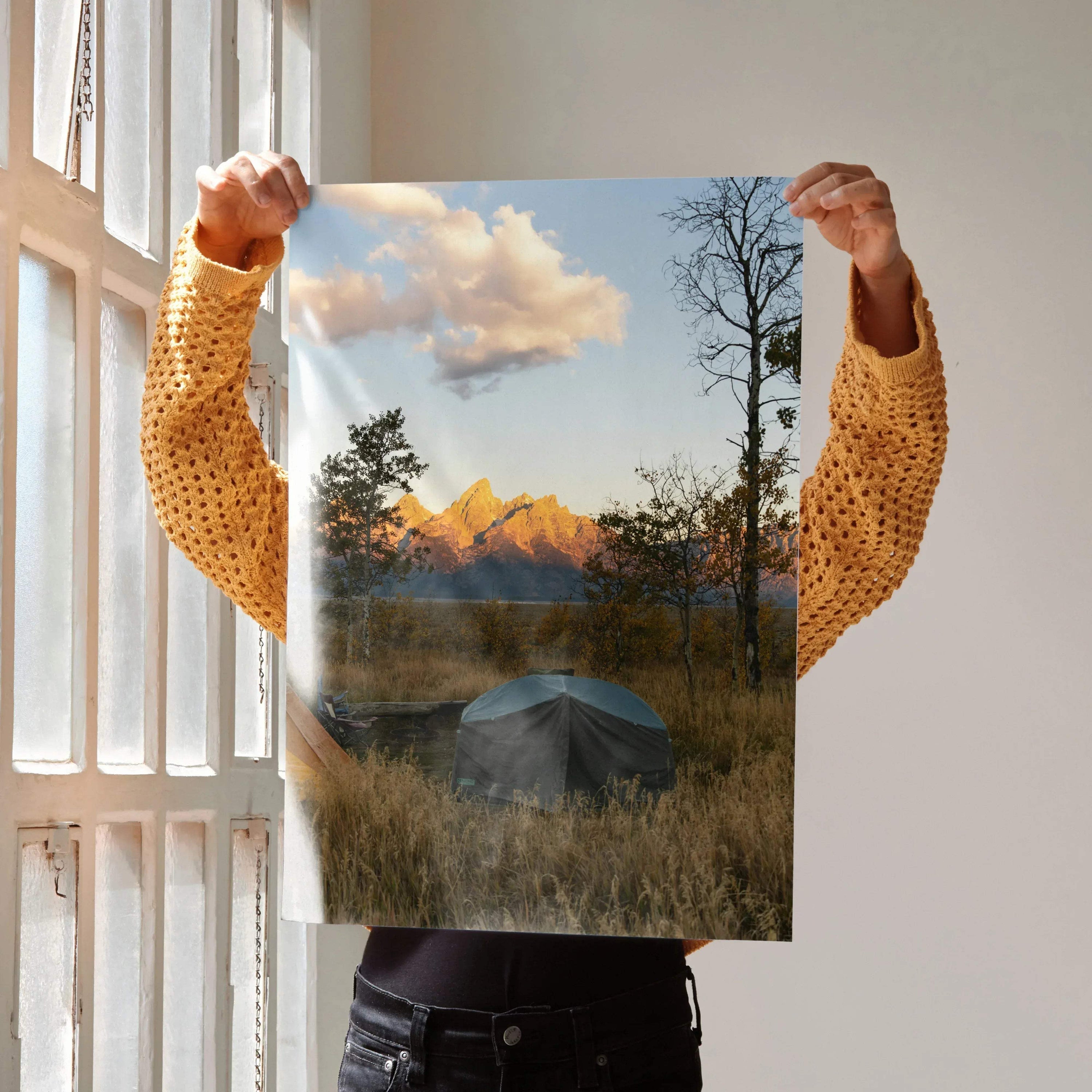 Vertical wall art poster featuring a sunset over majestic mountain peaks with a tent in the foreground.