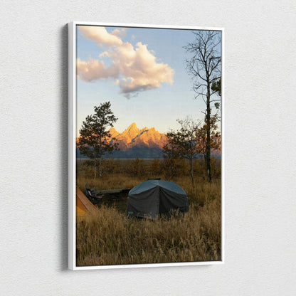 Canvas wall art featuring a sunset over mountains with tents and autumn trees.