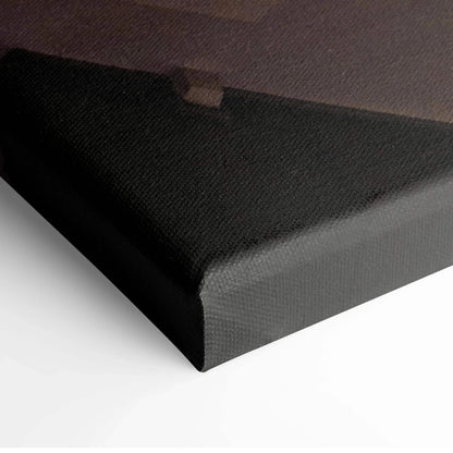 Black-edged canvas corner detail of urban architecture wall art with textured surface.