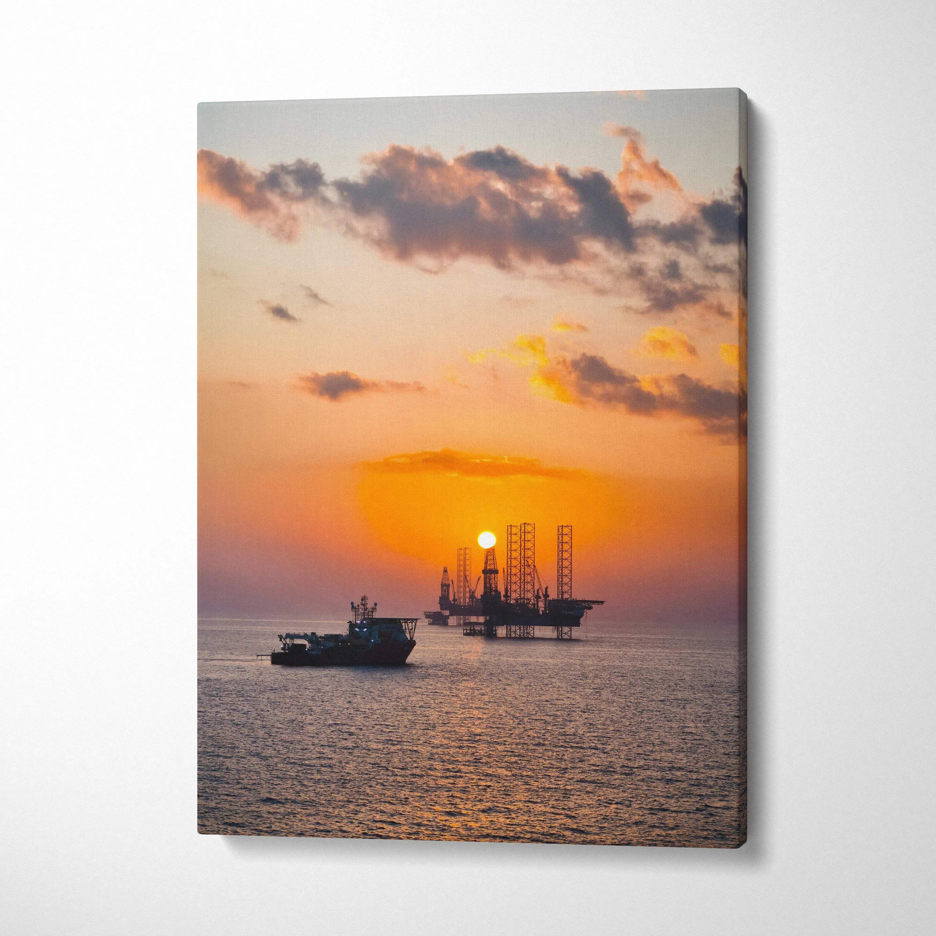 Canvas wall art featuring a vibrant ocean sunset with boats silhouetted against colorful sky.