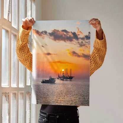 Vibrant ocean sunset poster with silhouetted ships and glowing sun over calm water wall art.