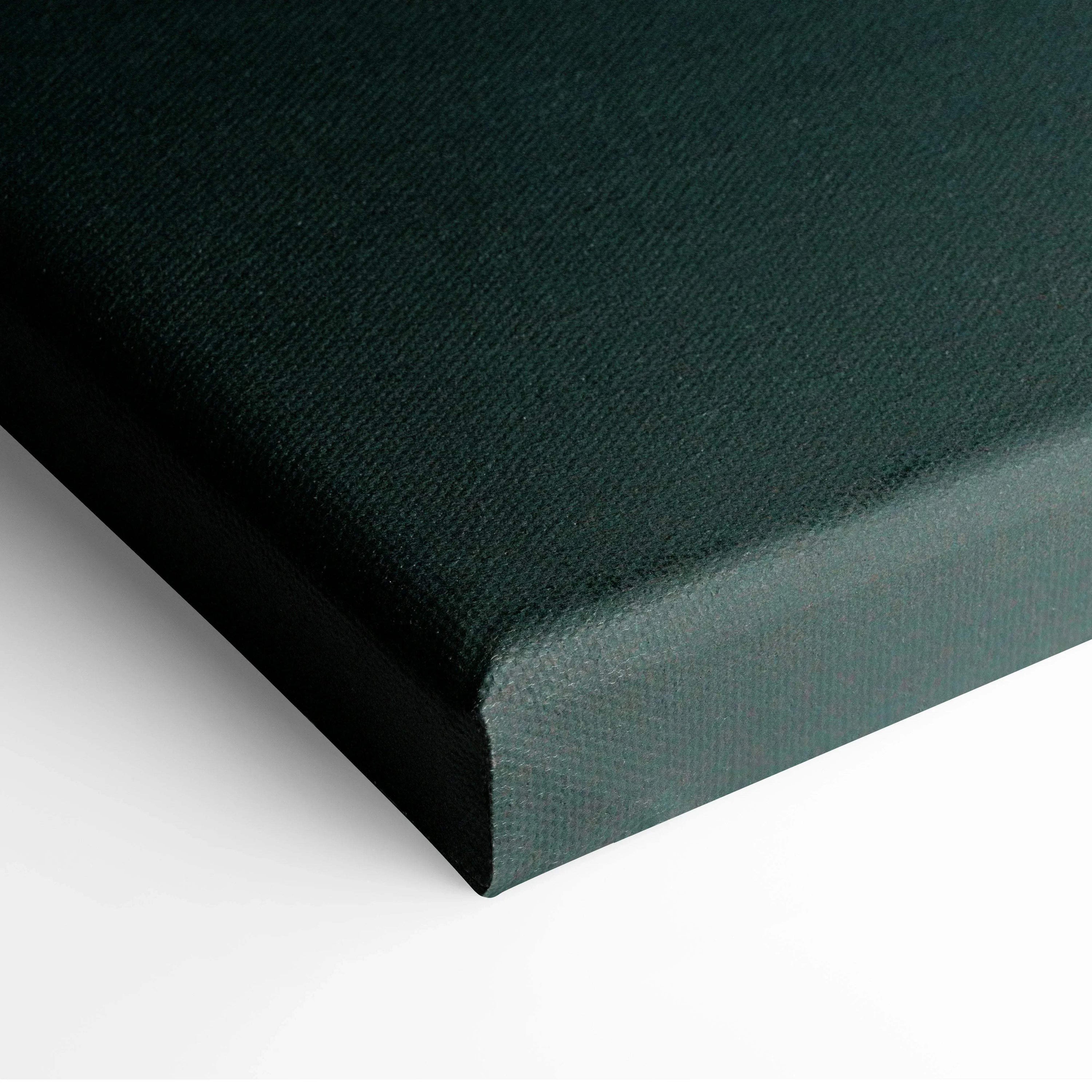 Close-up of dark teal canvas corner stretched on wooden frame for wall art.