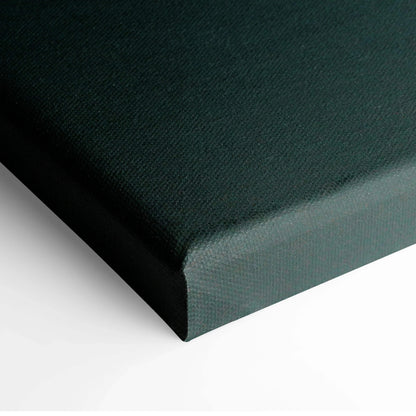 Close-up of dark teal canvas corner stretched on wooden frame for wall art.