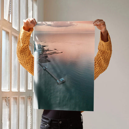Vertical poster of vibrant ocean sunset with pier extending into calm water, modern wall art.