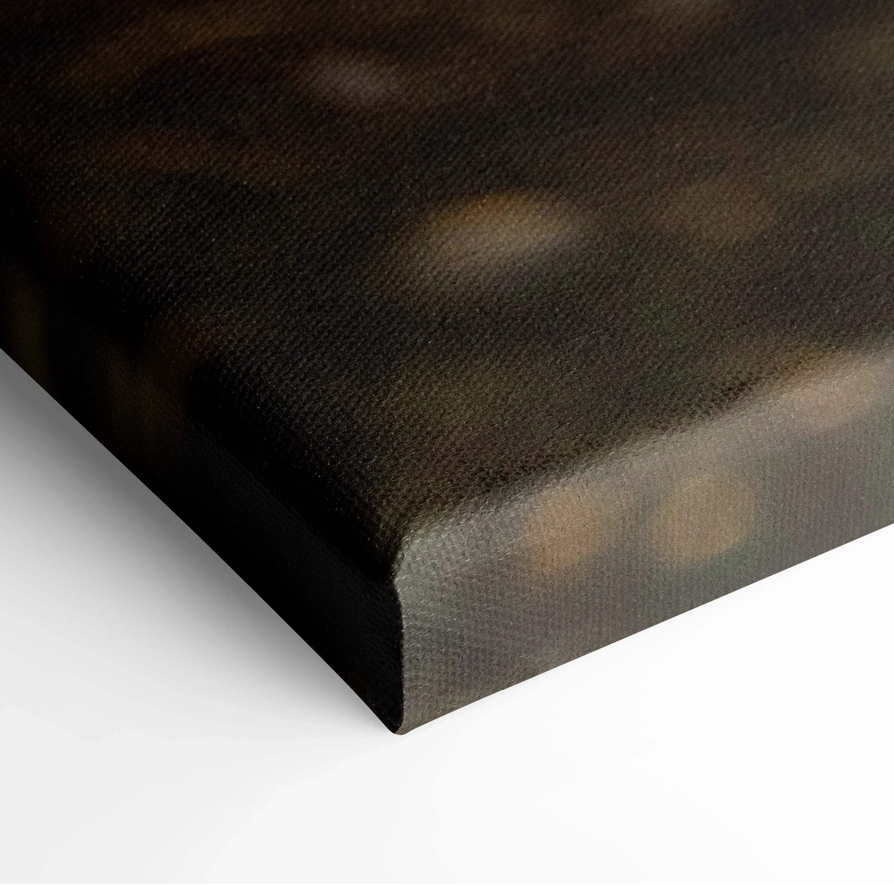 Close-up of dark-toned beach sunset canvas wall art wrapped around thick edges.