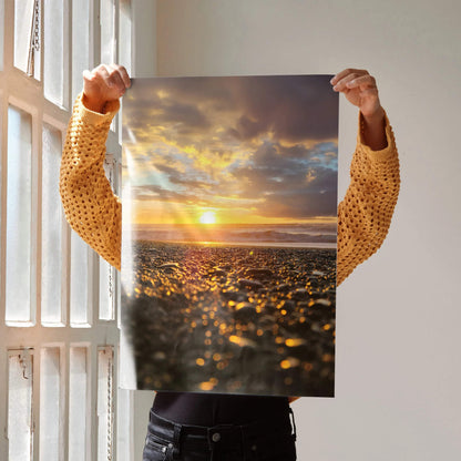 Ocean sunset beach poster with golden light and dramatic clouds, vertical wall art.