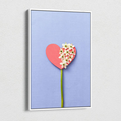 Pastel blue heart canvas wall art with white flowers on lavender background